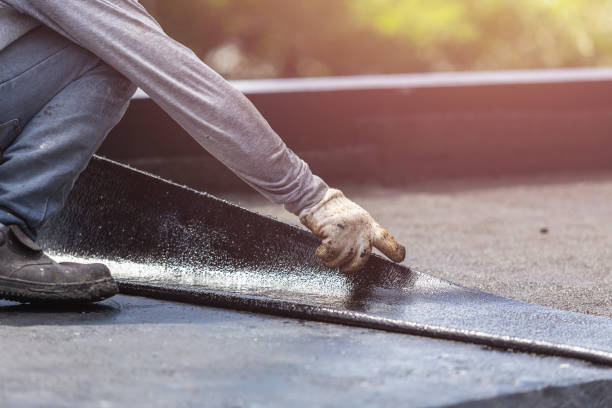 Professional Waterproofing technician working in Huntsville, OH